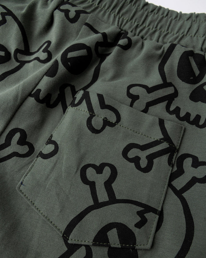 Close up detail of the Hello Skull Short in forest