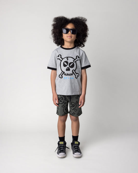 Kid wearing the Hello Skull Short in forest with the Hello Skull Tee in grey marle and black, front view
