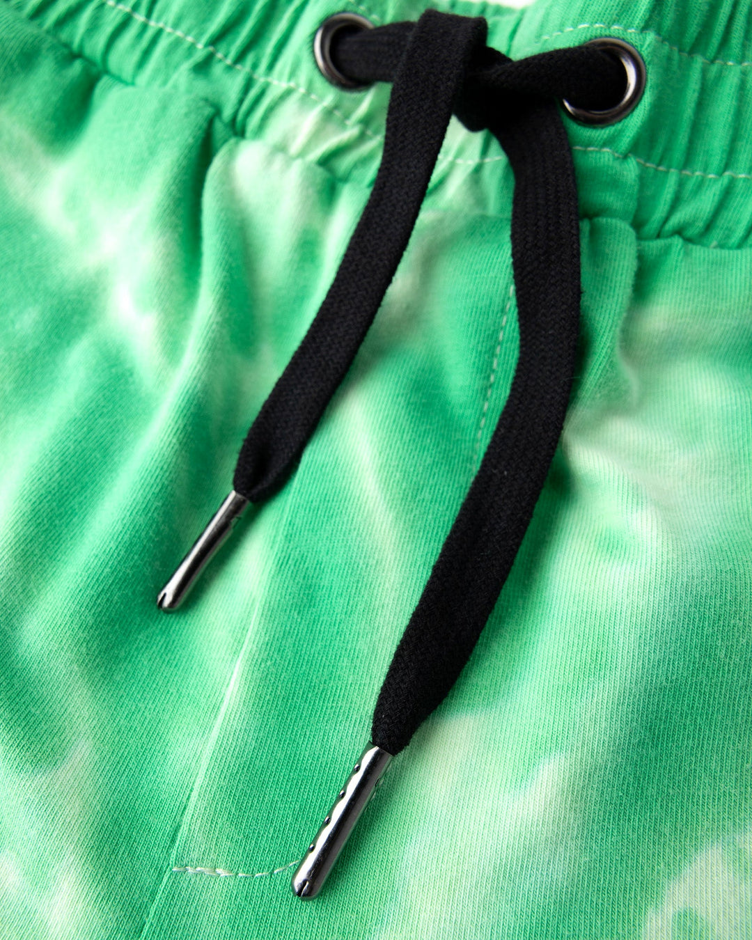 Close up detail of the Splatter Short in green