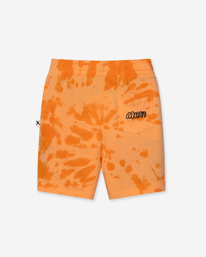 Splatter Short in orange, boys shorts by Minti, flat lay, back view