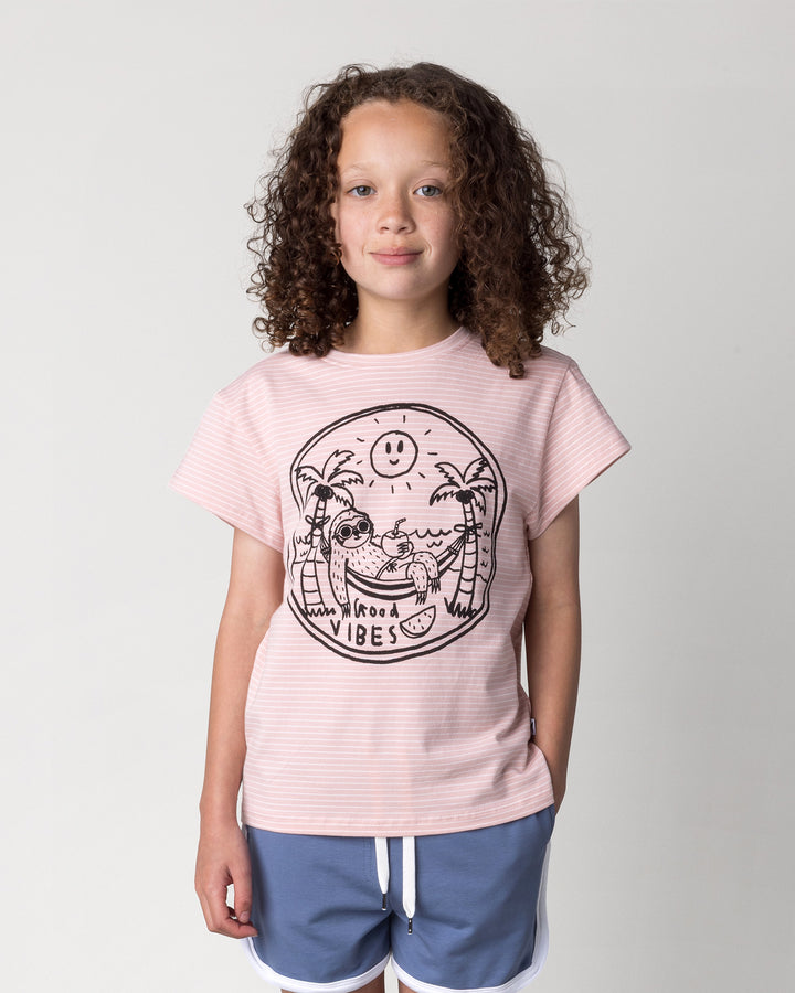 Close up of the Chill Sloth Tee in ballet stripe on a kid, front view