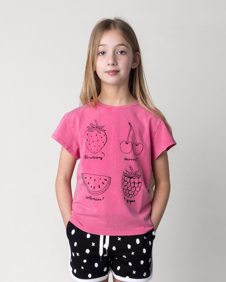 Close up of the Different Fruits Tee in pink wash on a kid, front view