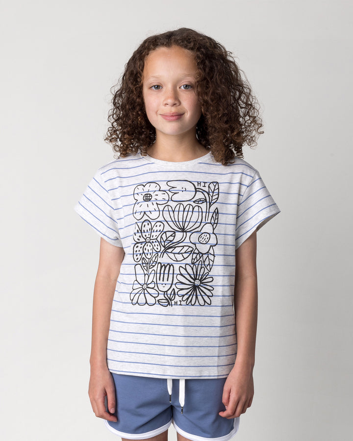 Close up of the Flower Party Tee in marle and blue stripe on a kid, front view