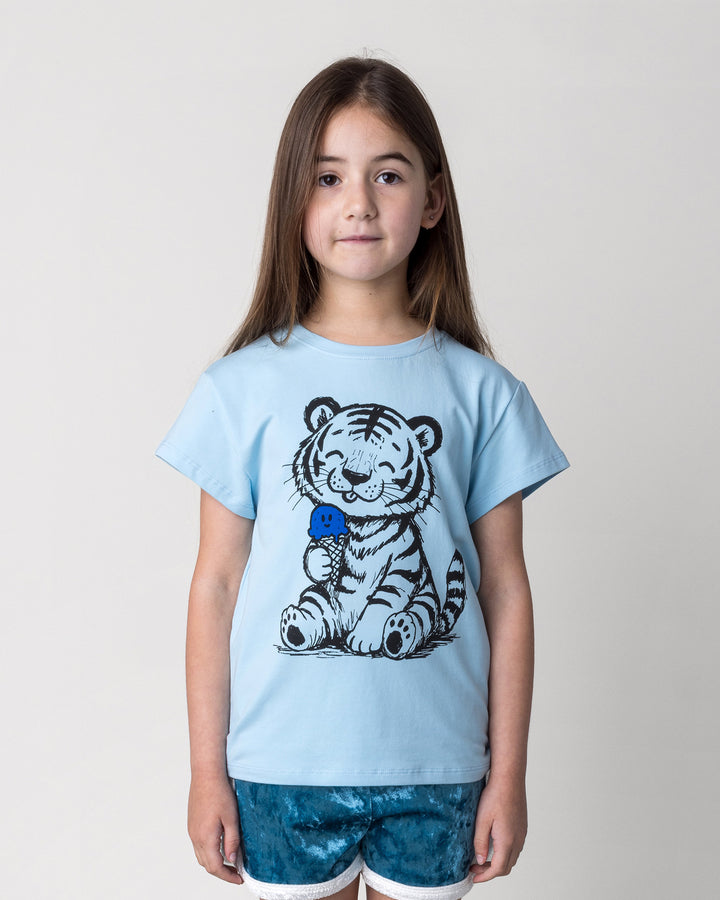 Close up of the Happy Tiger Tee in light blue on a kid, front view