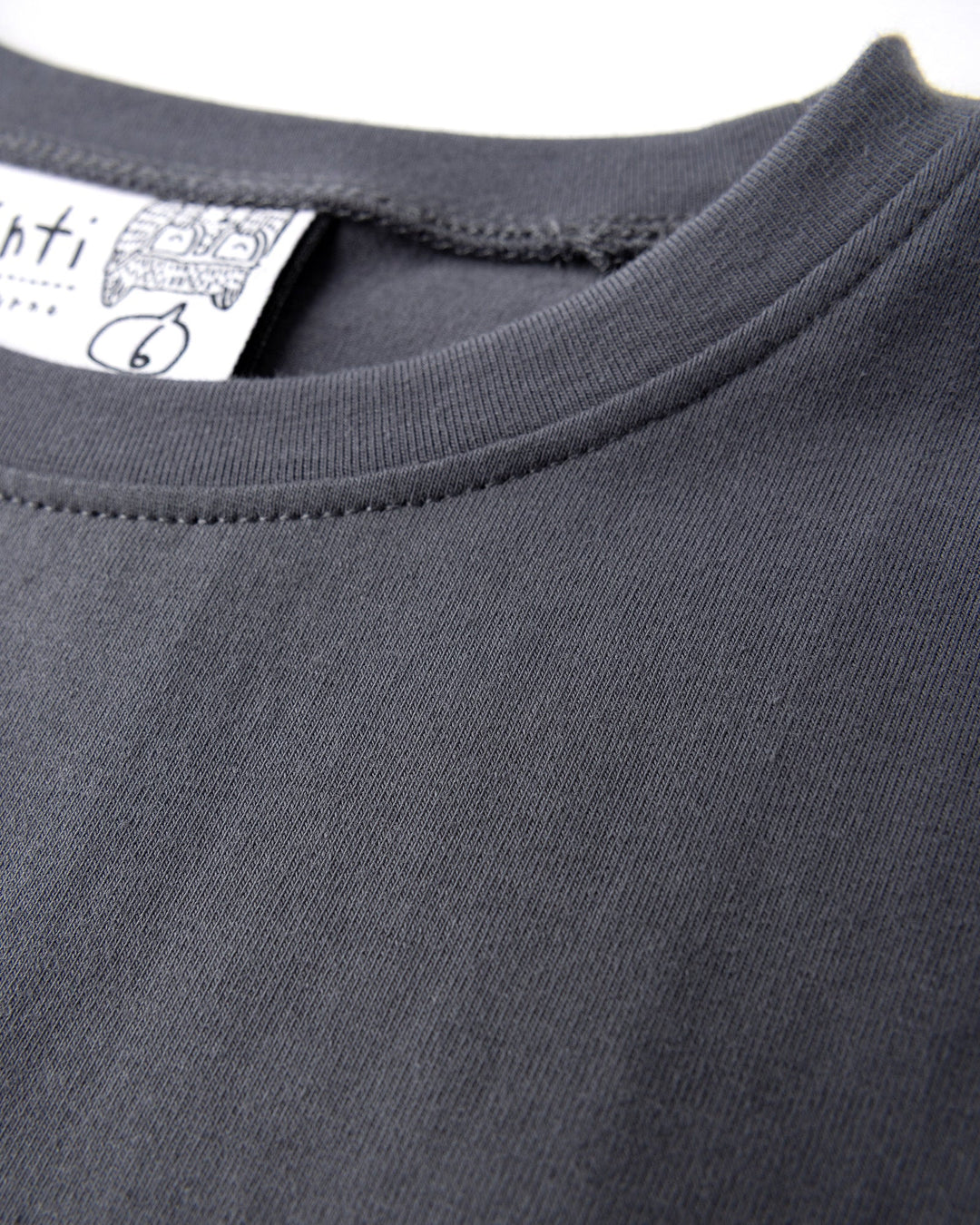 Close up detail of the Icecream Bunny Tee in dark grey