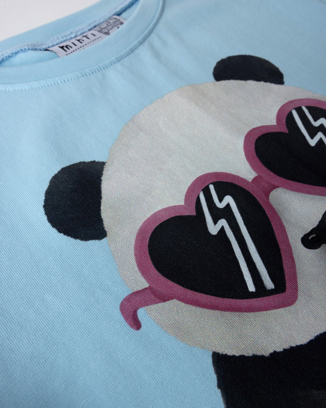 Close up of the Icecream Panda Tee print in light blue