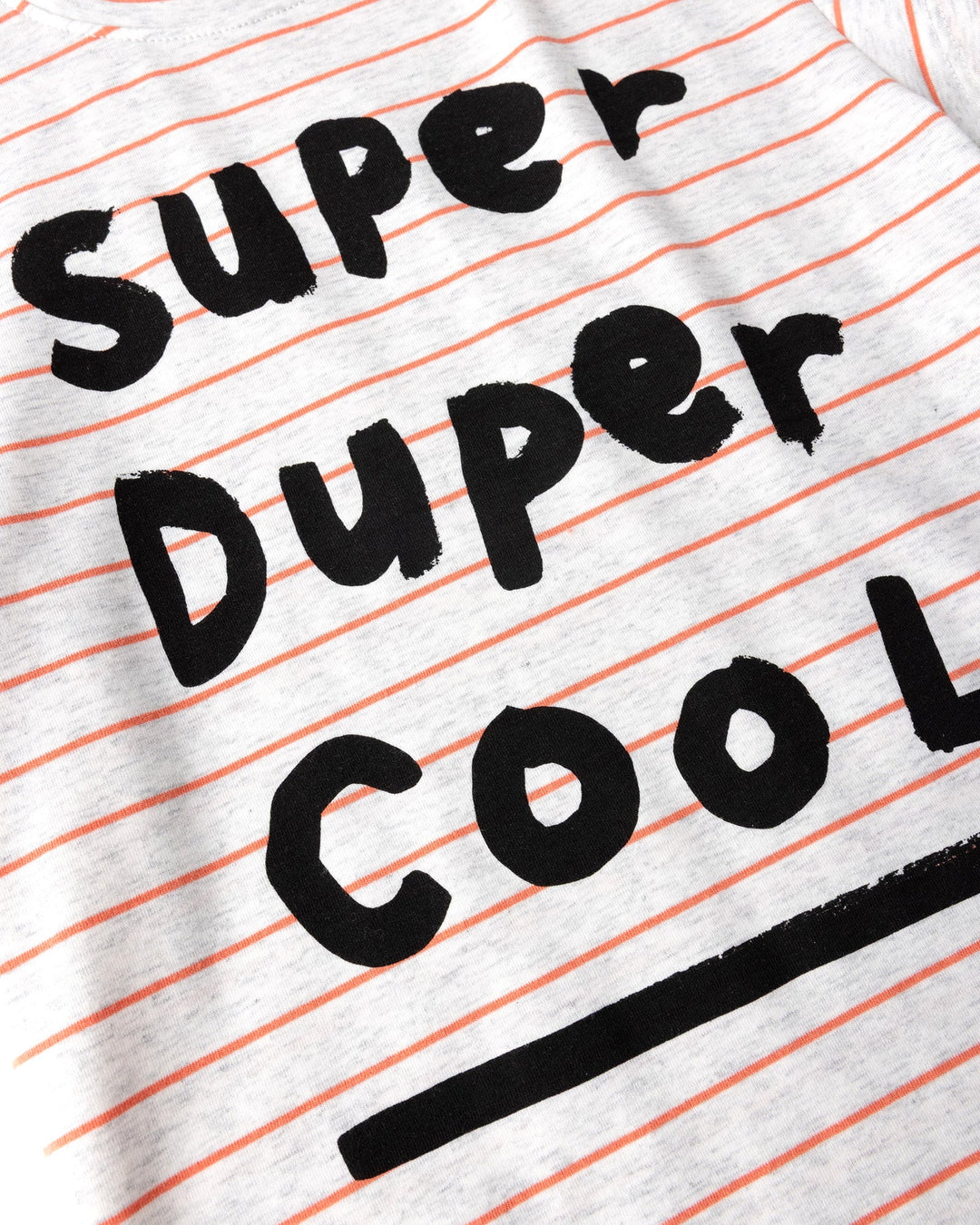 Close up of the Super Duper Cool Tee print in marle and coral stripe