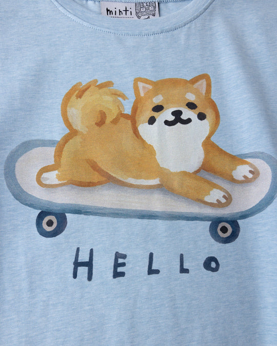Close up of the Skate Puppy Tee print in light blue marle