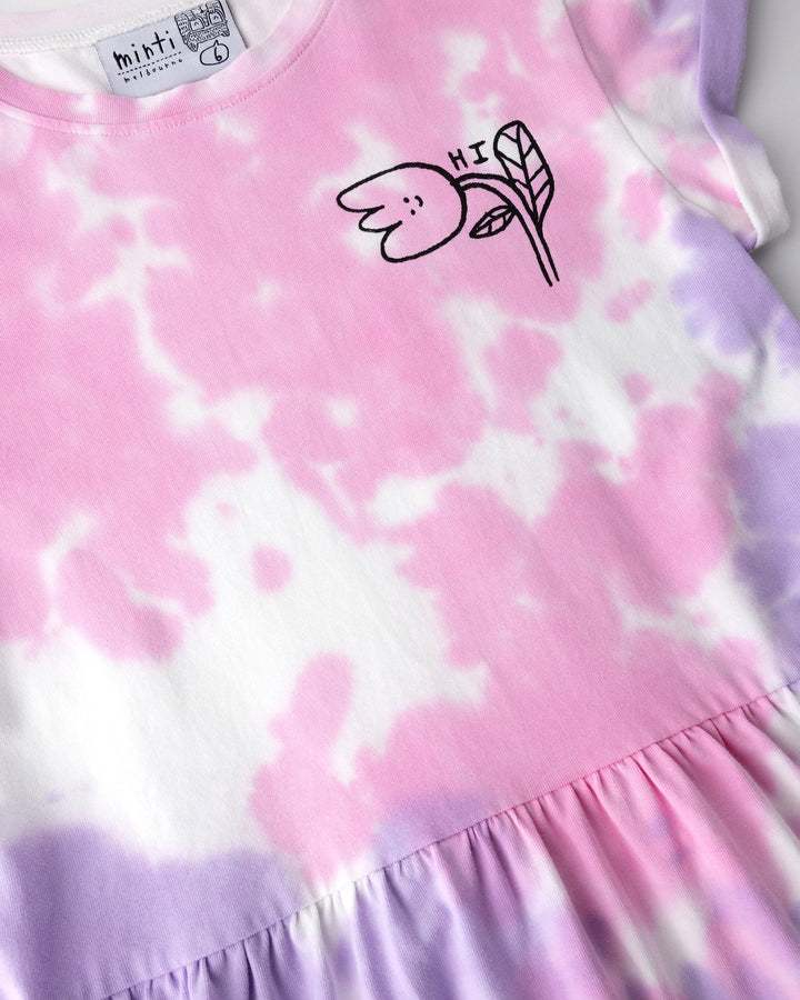 Close up of the Pocket Flower Dress print in tie dye