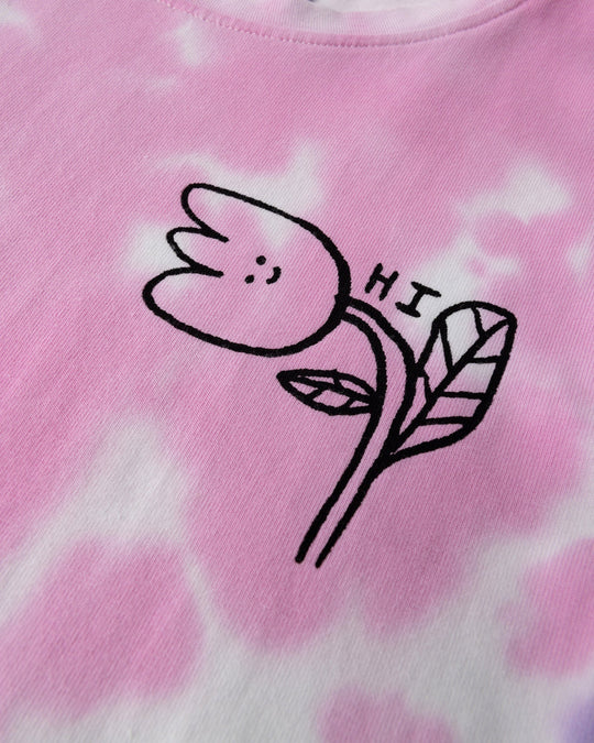 Close up of the Pocket Flower Dress print in tie dye