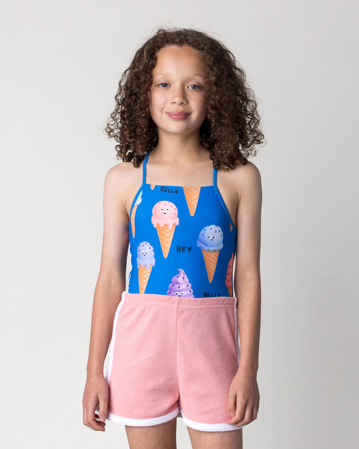 Close up of the Happy Icecreams Swimsuit in bright blue on a kid, front view