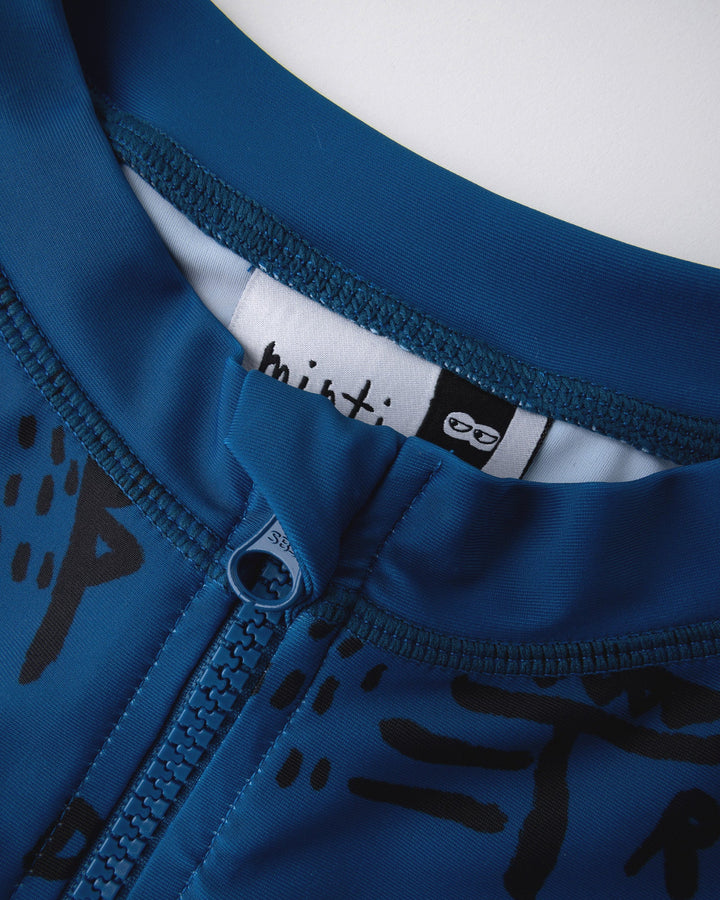 Close up detail of the Rad Croc Rashie in midnight