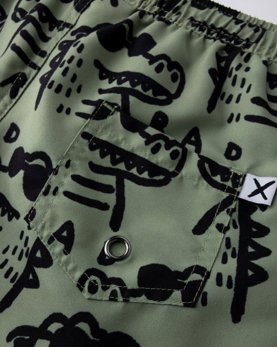 Close up detail of the Rad Croc Boardies in khaki