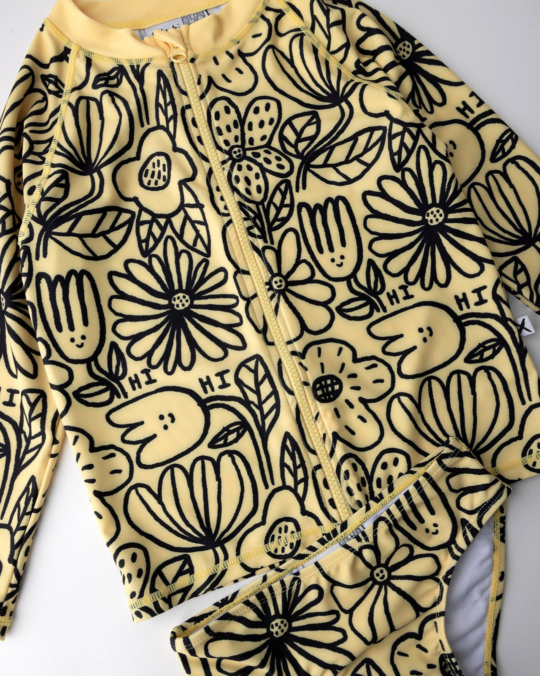 Close up of the Big Flowers Rashie Set print in sunshine