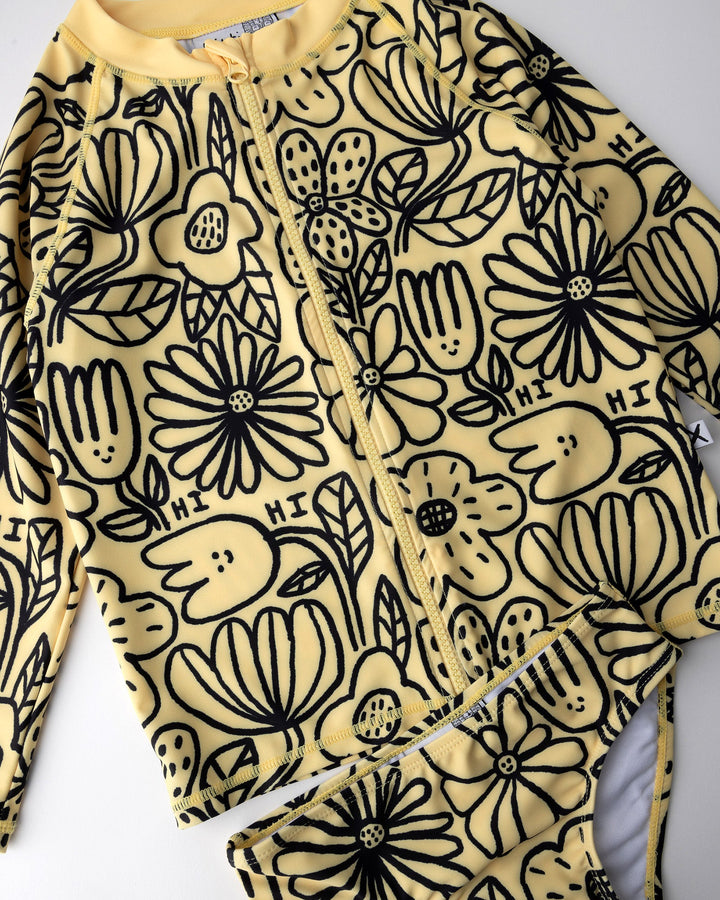 Close up of the Big Flowers Rashie Set print in sunshine