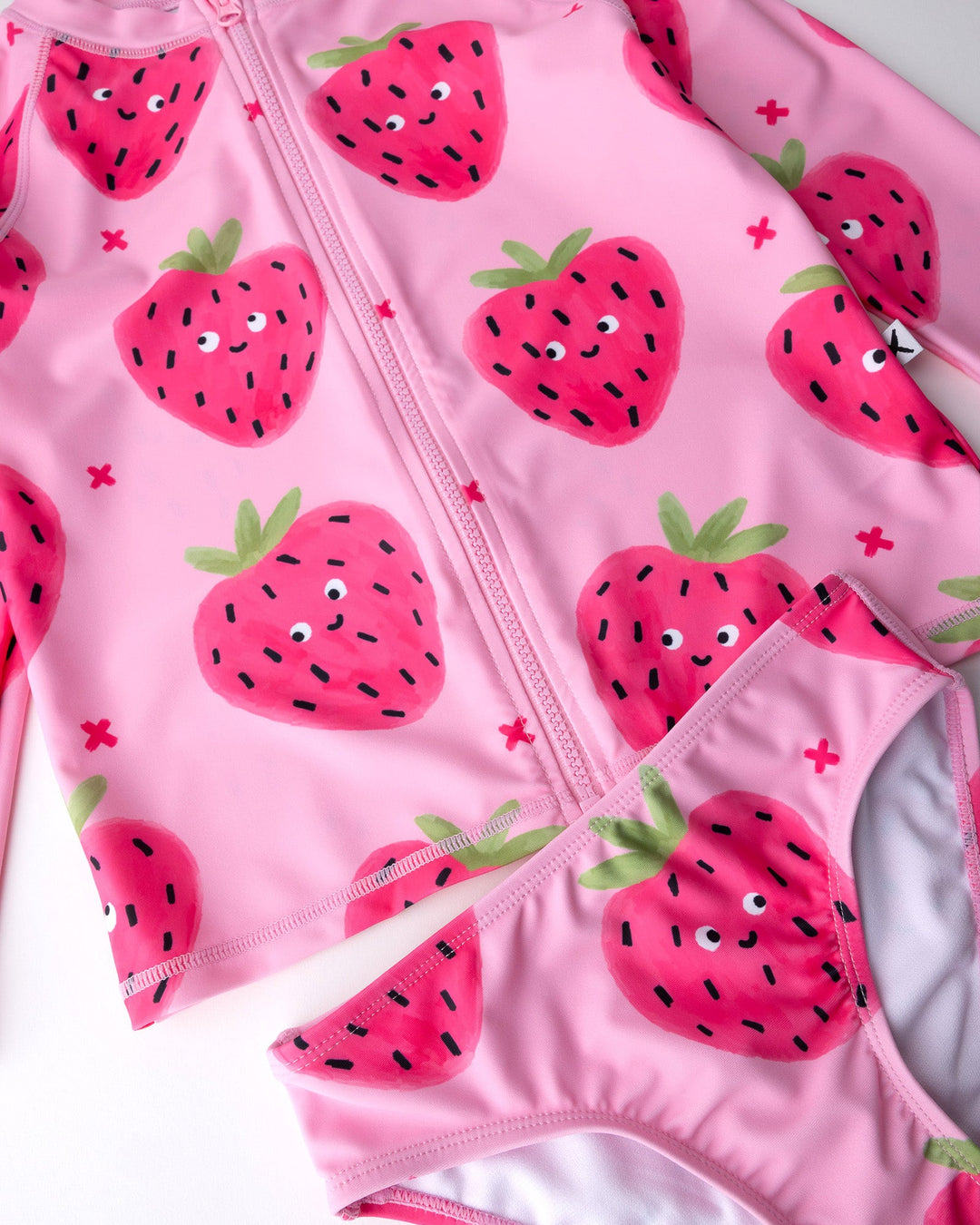 Close up of the Happy Strawberry Rashie Set print in ballet