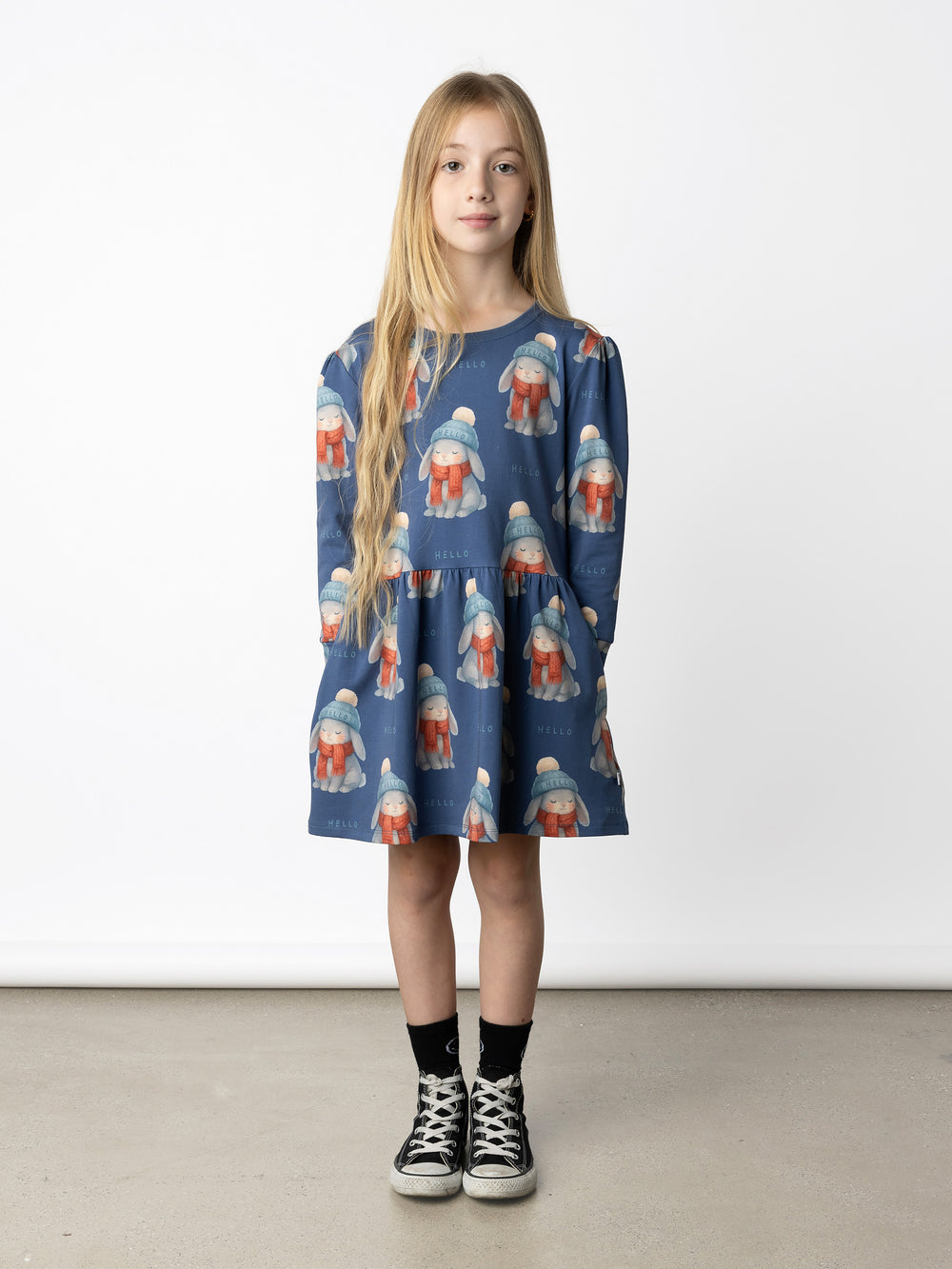 Minti kids clothing. Tshirting weight dress with self cuffs, hidden side pockets and waist seam with ruching detail. 190 Gram // 95% Cotton // 5% Elastane.