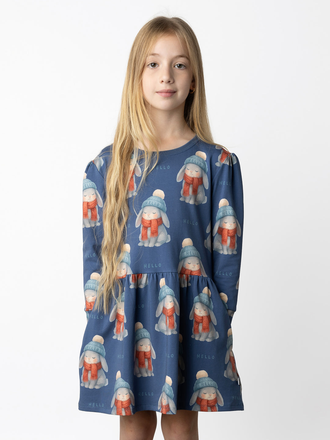Minti kids clothing. Tshirting weight dress with self cuffs, hidden side pockets and waist seam with ruching detail. 190 Gram // 95% Cotton // 5% Elastane.