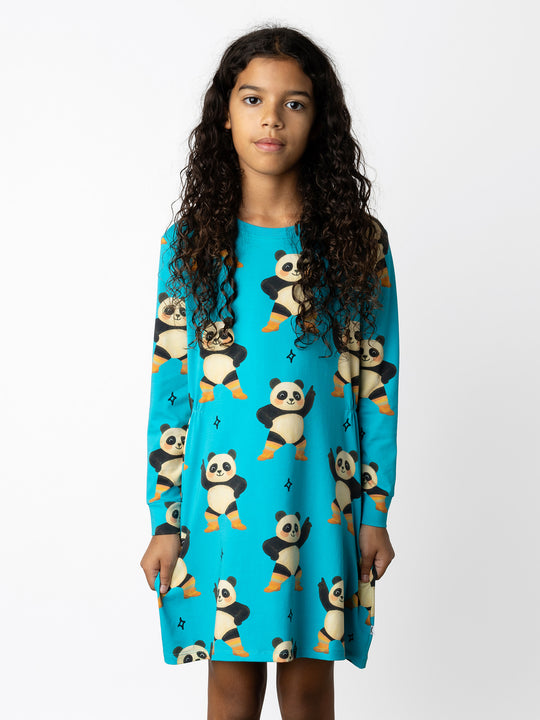 Minti kids clothing. Awesome tshirting weight dress with pinched waist detail. 190 Gram // 95% Cotton // 5% Elastane.
