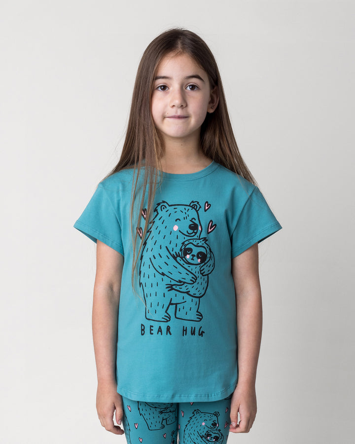 Close up of the Bear Hug Tee in emerald on a kid, front view