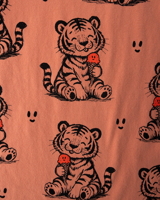 Close up of the Happy Tiger Tee print in apricot