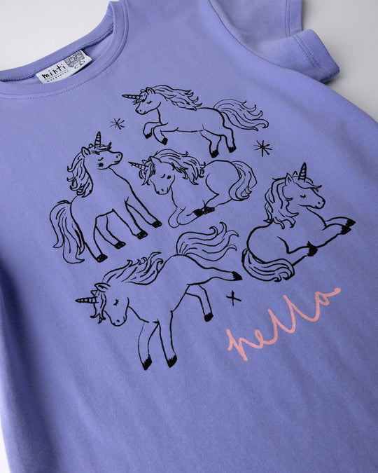 Close up of the Hello Unicorns Tee print in purple