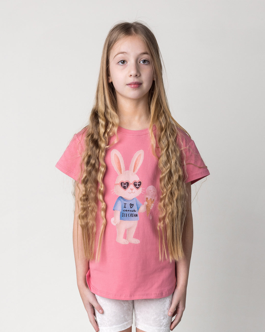 Close up of the Icecream Bunny Tee in candy on a kid, front view