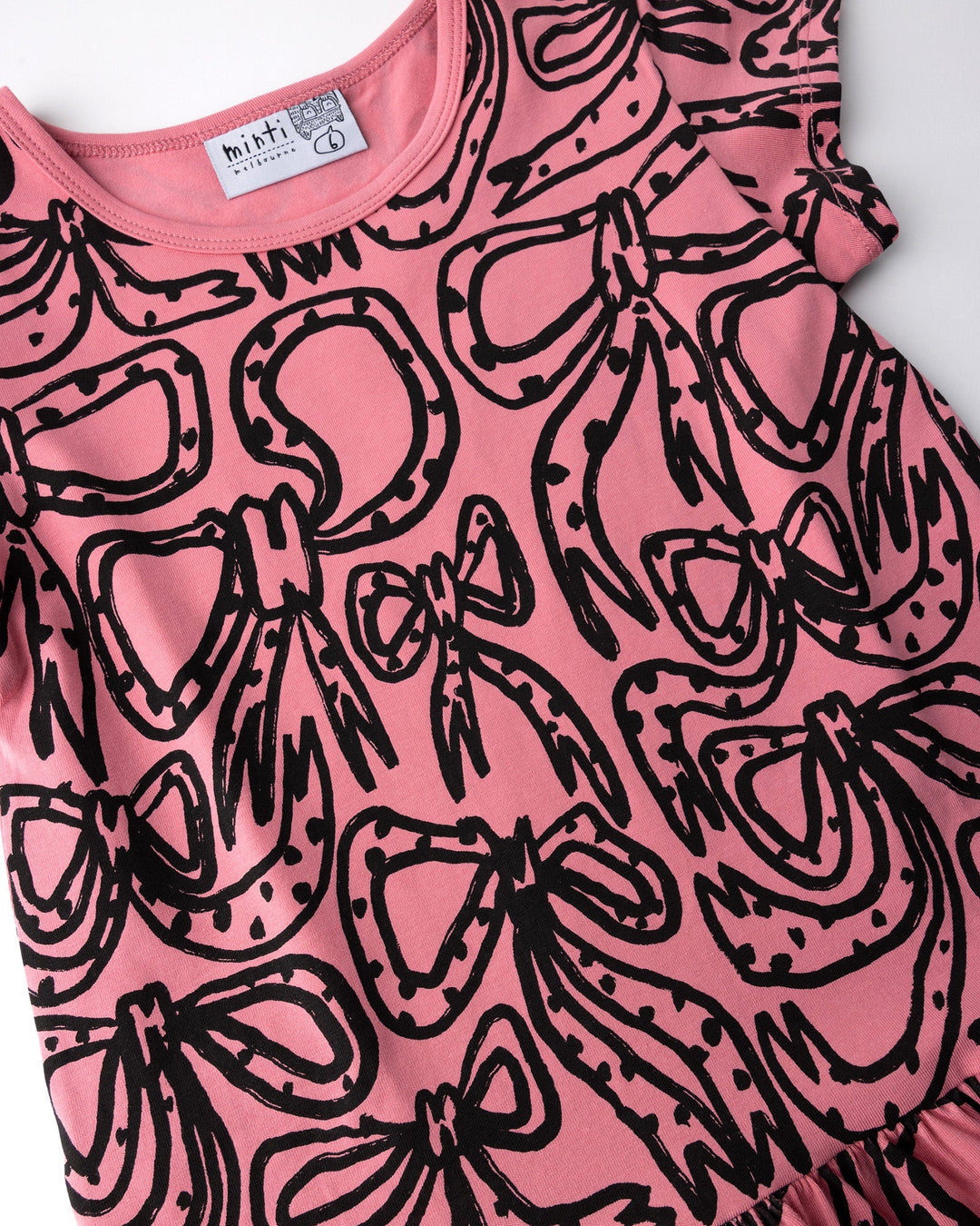 Close up of the Big Bows Dress print in candy