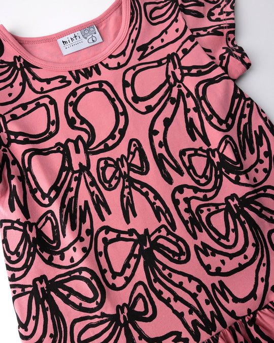 Close up of the Big Bows Dress print in candy