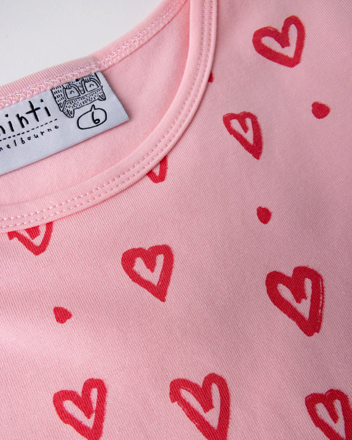 Close up detail of the Hearts Dress in pink