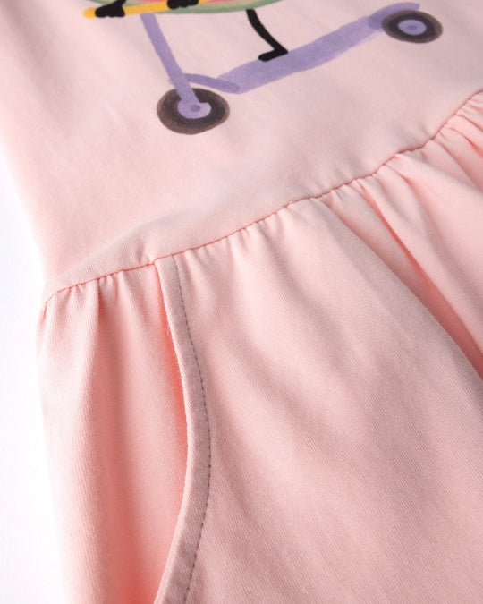 Close up detail of the Scooting Watermelon Dress in light pink