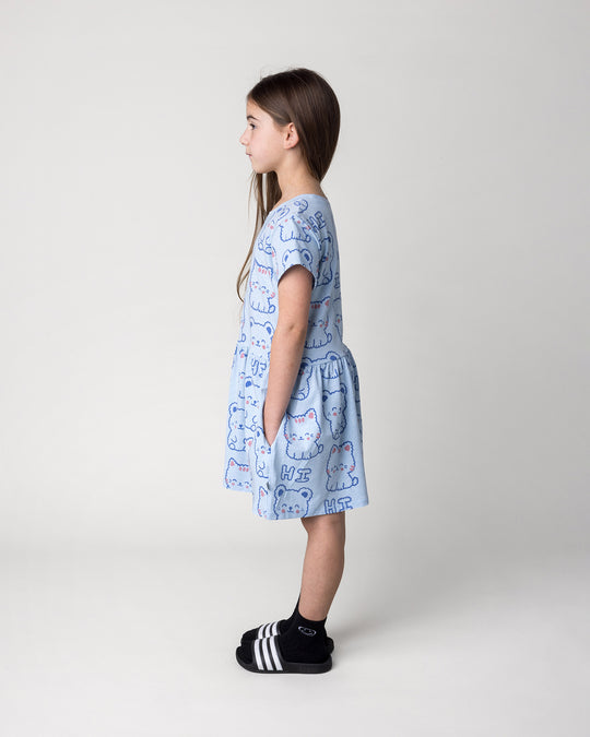 Kid wearing the Hi Cat Bear Dress in light blue marle, side view