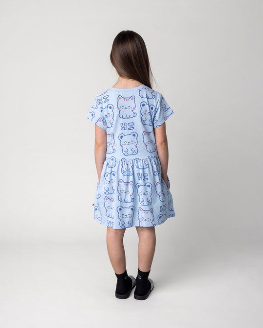 Kid wearing the Hi Cat Bear Dress in light blue marle, back view