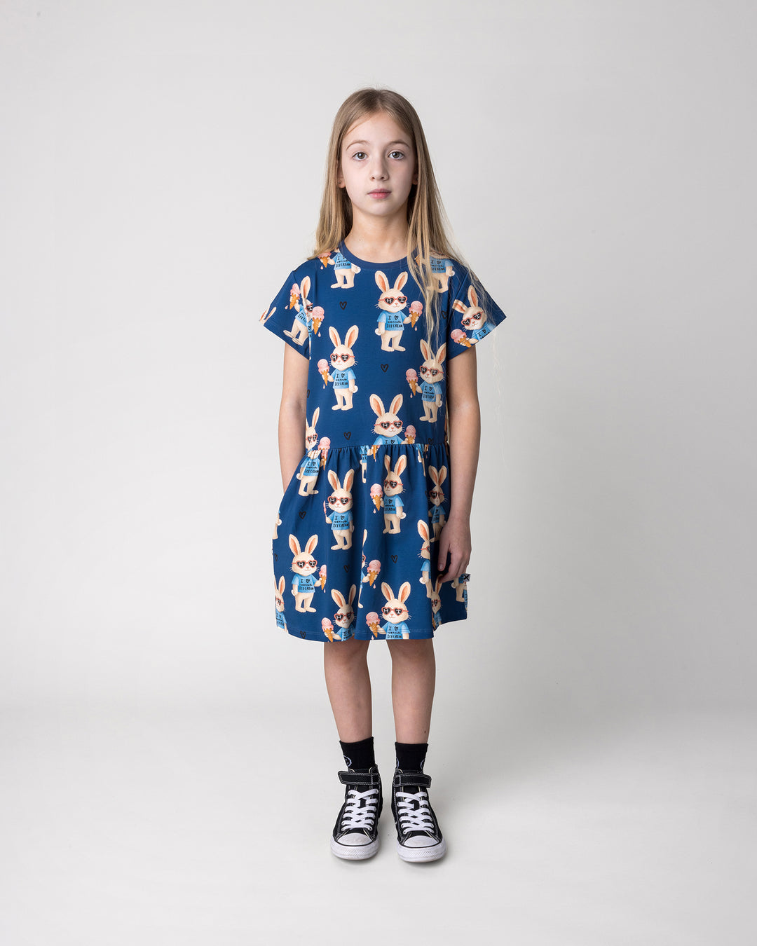 Kid wearing the Icecream Bunny Dress in blue, front view