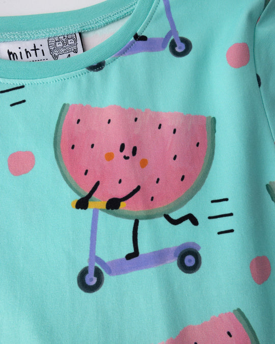 Close up of the Scooting Watermelon Dress print in light mint