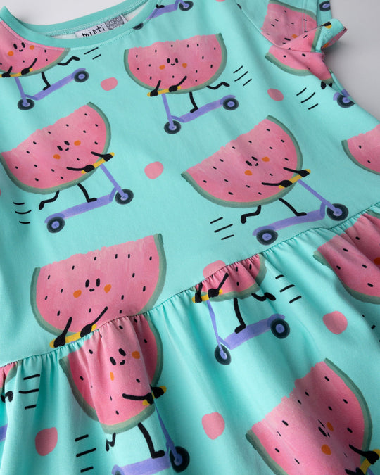 Close up of the Scooting Watermelon Dress print in light mint