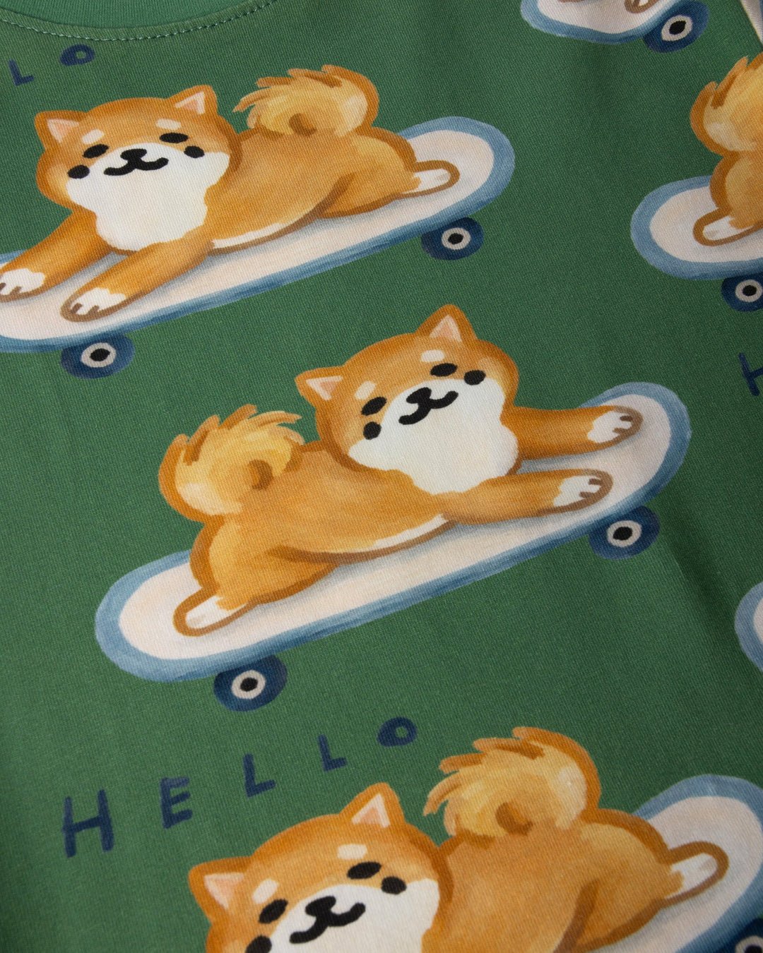 Close up of the Skate Puppy Dress print in turf