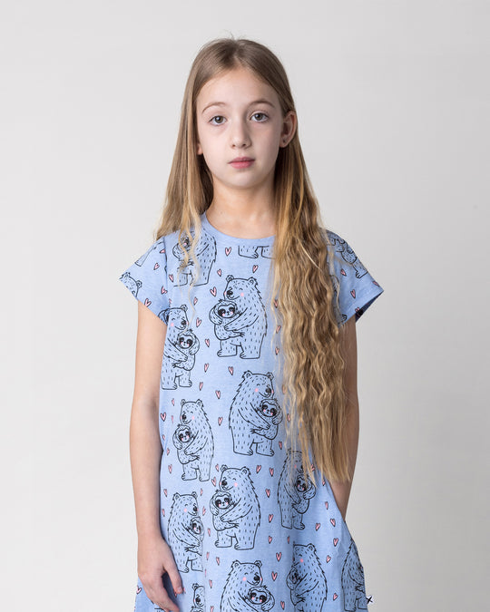 Close up of the Bear Hug Dress in blue marle on a kid, front view