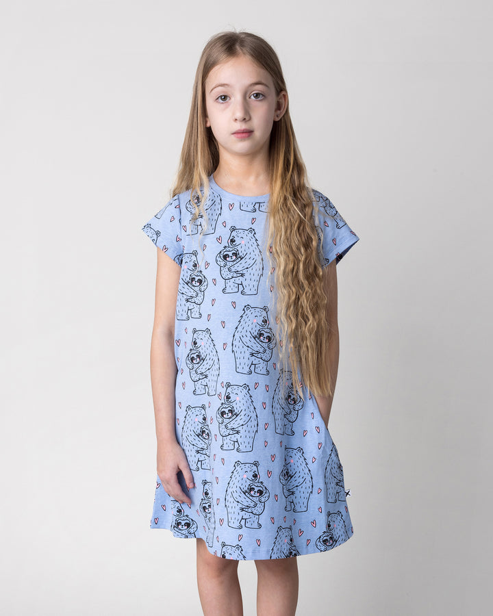 Close up of the Bear Hug Dress in blue marle on a kid, front view