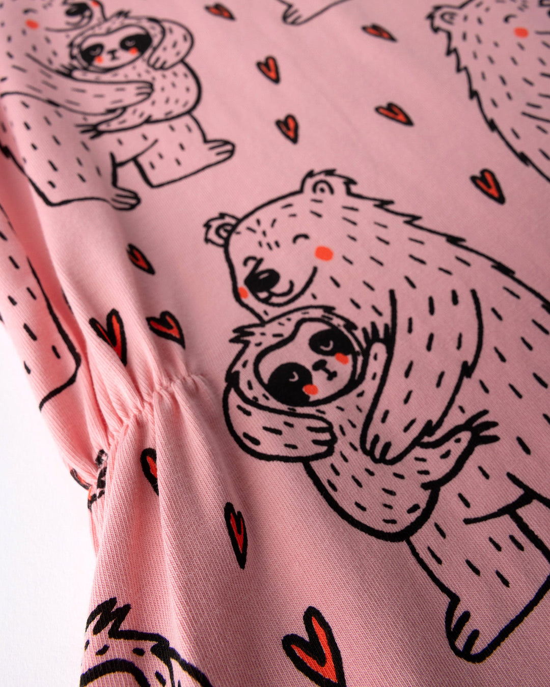 Close up of the Bear Hug Dress print in pink