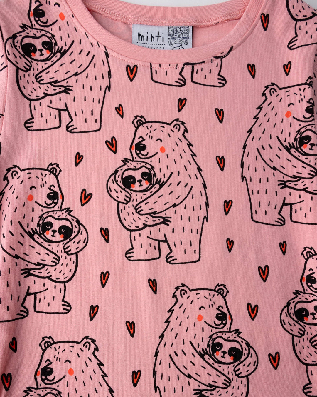 Close up of the Bear Hug Dress print in pink