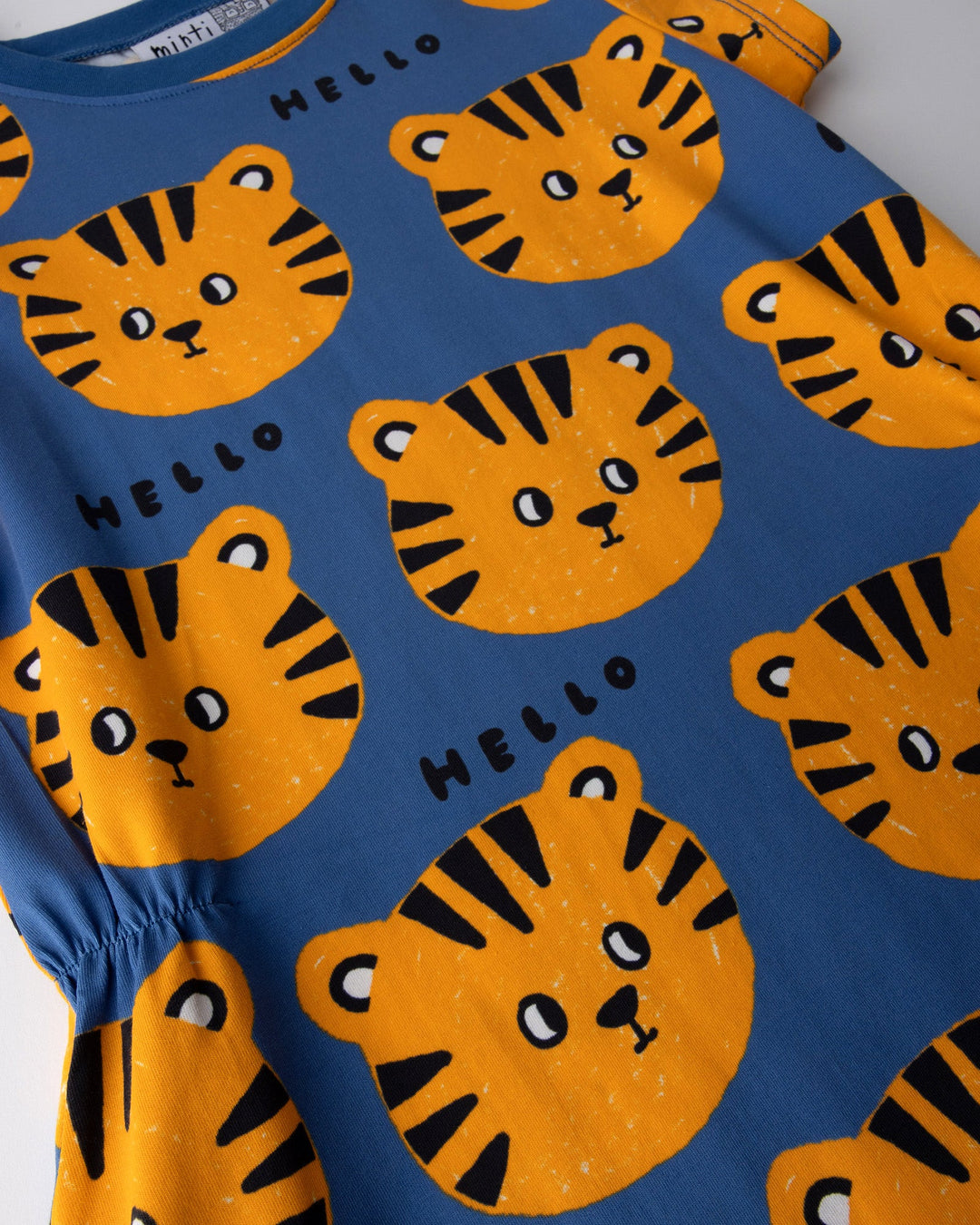 Close up of the Hello Tiger Dress print in blue