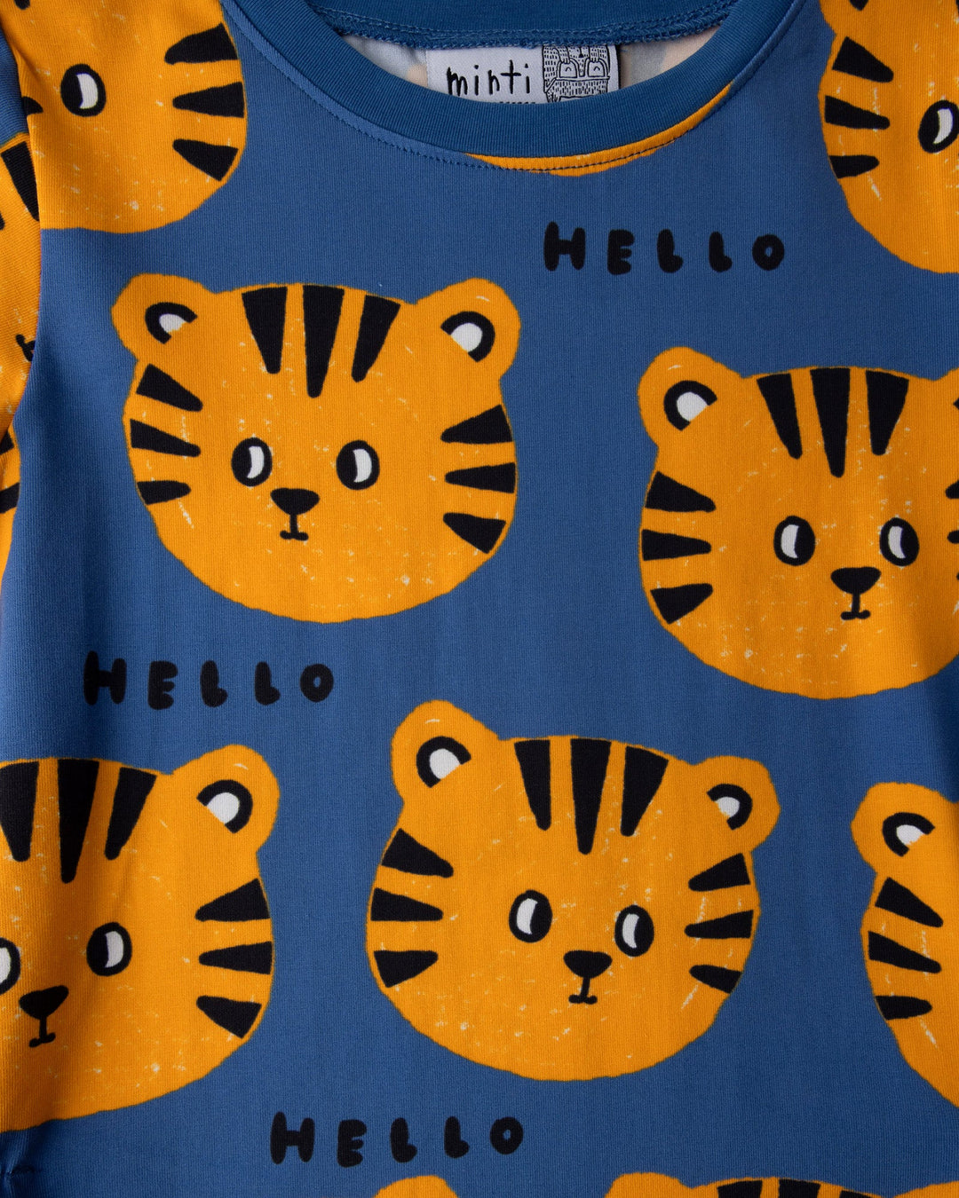 Close up of the Hello Tiger Dress print in blue