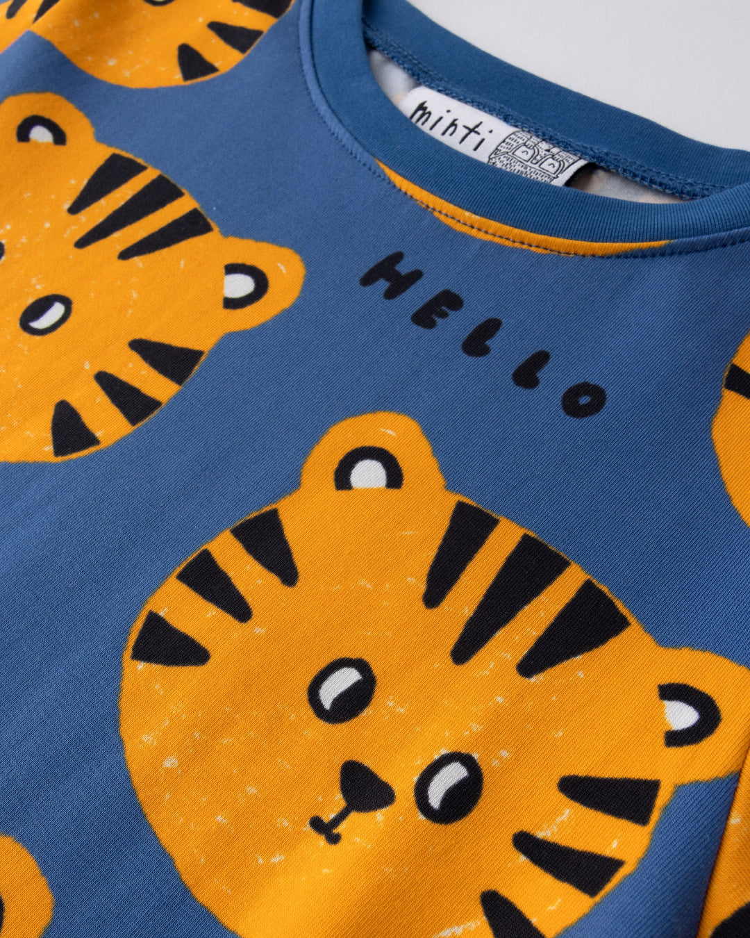 Close up of the Hello Tiger Dress print in blue