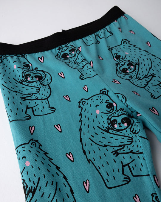 Close up of the Bear Hug Bike Pant print in emerald