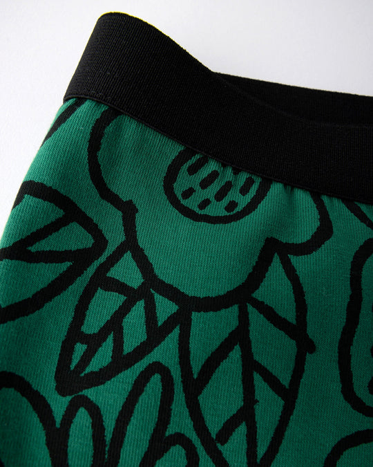 Close up detail of the Big Flowers Bike Pant in kelly green