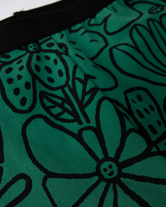 Close up detail of the Big Flowers Bike Pant in kelly green