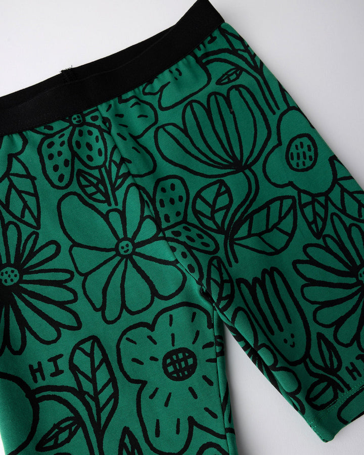 Close up of the Big Flowers Bike Pant print in kelly green