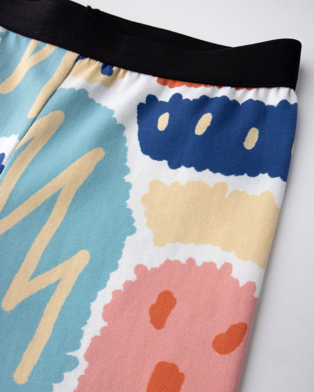 Close up of the Cool Shapes Bike Pant print in white