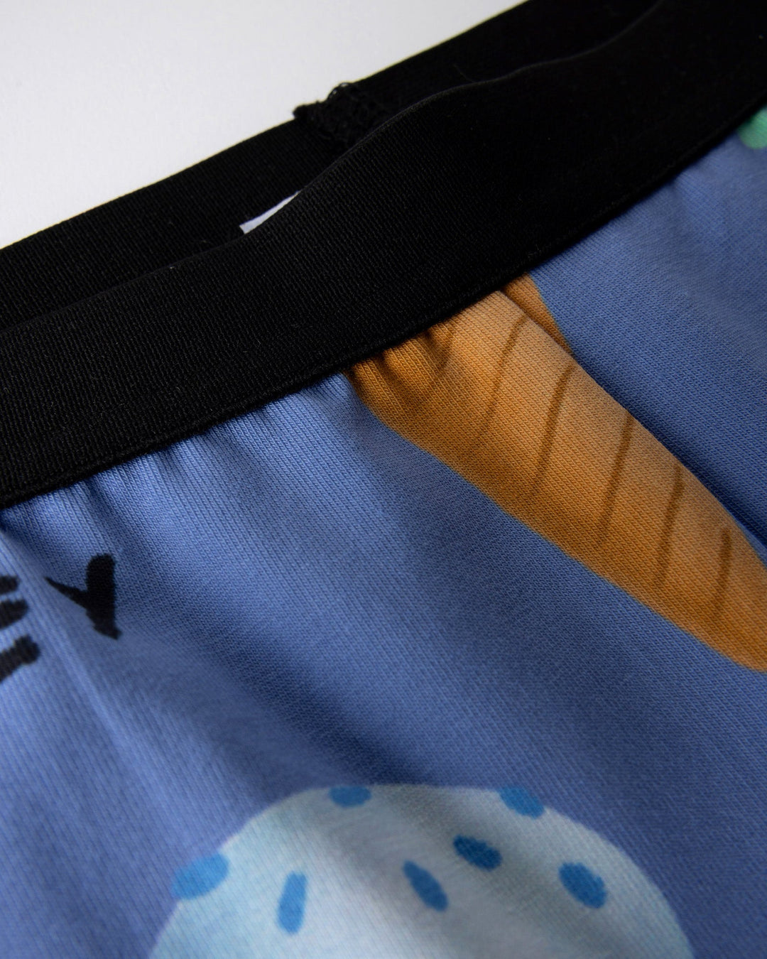 Close up detail of the Happy Icecreams Bike Pant in cornflower